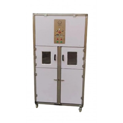 Jewelry flipping and powder removing machine